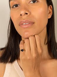 Mini diamond, onyx and gold heart signet ring by Yvonne Leon