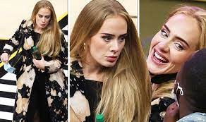 The cold shoulder songstress, 33, was pictured laughing with rich, 39, who leant into her. Og4tkwjjvwr9pm