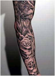 Black And White Floral Tattoo Sleeve Menssleevetattoo Sleevetattoos Black And White Floral With Lion Head Tattoo On Man Full Sleeve Tattoos For Guys Men Flower Tattoo Sunflower Tattoo Shoulder