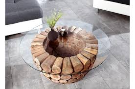 Une table de salon toute en transparence qui a été conçue afin d'apporter de l'éclat à votre salon. Table Basse Ronde Originale Bois Et Verre Pour Salon
