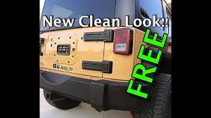 This plate mounts using the oem hardware (no drilling). Jeep Jk Spare Tire Carrier Removal Decal Install Jeep Updates Youtube