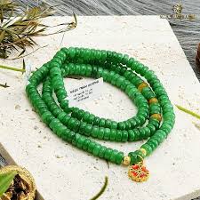 Vòng tay đá cẩm thạch bánh xe mix charm vàng 24k