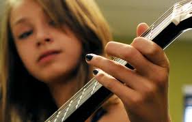 QUICK DRAW: Missoula guitar instructor passes down his passion for music