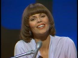 Dawn: "Laughter in the Rain