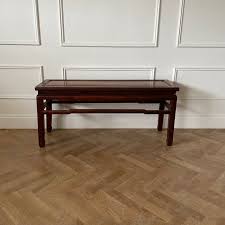The finish shows wear on the table top. Vintage Chinoiserie Rosewood Coffee Table The Ceh
