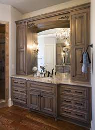 A double walnut vanity is topped with a clean white countertop in this chic bathroom. 52 Master Bath Ideas Bathroom Design Bathrooms Remodel Bathroom Vanity Cabinets