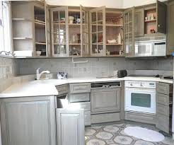 These cabinets have a wood grain. Pin By Anita Ronan Hunter On Kitchen Ideas Distressed Kitchen Cabinets Kitchen Cabinets Painted Grey Distressed Kitchen