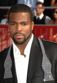 He's looking sharp with long curls on top and down the back and shaved sides with a line accent. 40 Sexiest Men Of All Time Essence