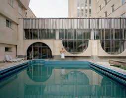A Wrestler Prepares For A Swim At The Aurora Sanatorium In Kyrgyzstan Image Michal Solarski Architecture Landmark Soviet Pool