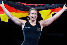 Germany's aline rotter focken reacts as he wrestles china's zhou qian in their women's freestyle 76kg wrestling early round match during the tokyo 2020 olympic games at the makuhari messe in. Yg Hlwees3q0mm