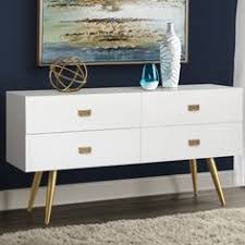 Green tall boy dresser with vintage hardware and detailed trim in a transitional bedroom beside a black and white chair accented. 8 Best White And Gold Dresser Ideas Gold Dresser White And Gold Dresser Bedroom Decor