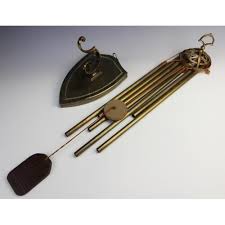Add soothing sounds to the garden with our selections of garden windchimes including brass and cast iron wind chimes for the home as well. Lot Art An Art Nouveau Style Brass Wind Chime The Seven Chime Rods