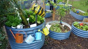 Round Metal Pots School Garden Garden Design Vertical Succulent Gardens