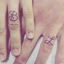 35 Sweet Simple Wedding Band Tattoos Wedding Band Tattoo Tattoo Wedding Rings Ring Tattoos