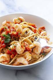 The Best Shrimp Pasta With A Fork In A Serving Plate Ready To Be Eaten Italian Recipes Italian Recipes Authentic Italian Recipes Traditional