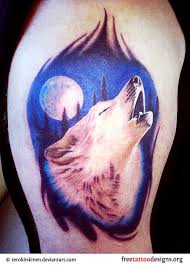 Dark blue tribal wolf head tattoo. 18 Howling Wolf Tattoo Designs Images And Photos