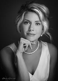 My friend Emma. I'm really inspired by traditional photography. I think  that this is the direction that I'm heading in with respect to my  portraiture. Shot the session both with film and