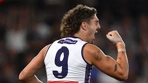 Flying Luke brings dukes with towering grab and goal