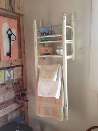 An Old Chair Turned Upside Down And Nailed To Wall Cool Idea For Towel Rack Diy Furniture Home Decor Repurposed Furniture