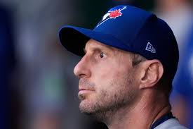 Chuck Doyle 'AKA' 'Coffee Cup Chuck' Receives Honorary Doctorate from UGCSI  at Public Event in Overland Park, KS