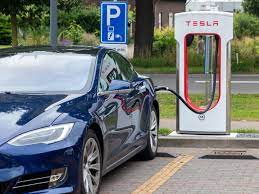 Tesla model s charging at a tesla supercharger station in oslo, norway. How Long Does It Take To Charge A Tesla Cash Cars Buyer