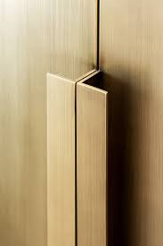 A Big Monolith In Natural Stone And Bronze Door Handle Design Door Handles Wardrobe Door Handles