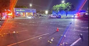 5th man charged in connection with parking lot shootout