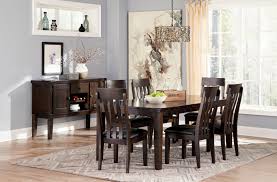 How much space is needed for a dining table and chairs? Signature Design By Ashley Haddigan Formal Dining Room Group Conlin S Furniture Formal Dining Room Groups