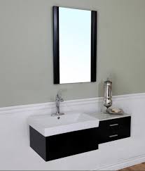 The teardrop shower wall in this wet bath echoes the lines of the sink which creates a smooth and seamless look. Hottest Space Saving Bathroom Trends For 2015 Space Saving Bathroom Bathroom Trends Single Sink Bathroom Vanity