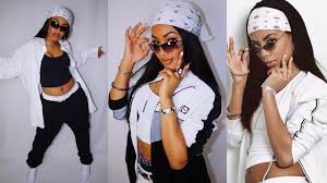 Aaliyah is effortlessly cool in faux fur white coat and black shades getty. Aaliyah Makeup Hair And Outfits Youtube