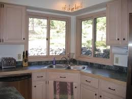 Small contemporary kitchen renovation for condo. 18 Space Saving Corner Sink Ideas That Are Ideal For Small Kitchens Corner Sink Kitchen Kitchen Layout Kitchen Design