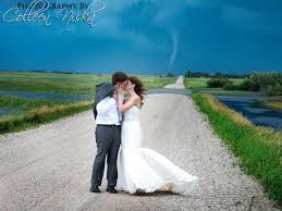 Elaine thompson and her husband derron herah (photo: Tornado Lurks In Background Of Couple S Wedding Pictures Cbs News