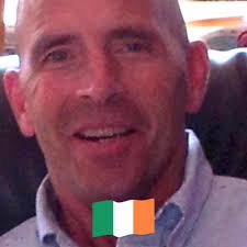 Who is in this historical photograph taken in Lansing?