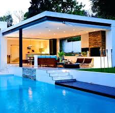 They have many uses, but are primarily built to provide a restroom and changing area for swimmers near the pool. Pool House Piscine Pool House Piscine Rbw Pool House Designs Modern Patio Design Pool Houses