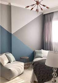 There's plain white paint on the walls with a white comforter and brown designs. Pin On For The Home