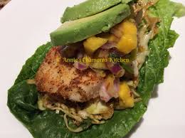 Think of your favorite lightly fried fish, topped with coleslaw, some super flavored mayonnaise, a squeeze of lime, maybe a little thinly sliced onion and jalapenos. Fish Tacos With Mango Salsa And Tangy Coleslaw Annie S Chamorro Kitchen