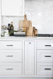 With so many design choices, picking the right hardware for your kitchen cabinets can be daunting. 5 Stylist Approved Tips For Decorating Your Kitchen This Holiday Season