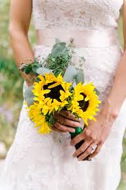 The wedding bouquet has been a standout feature among royal brides over the years. Wild Western Wedding In Colorado Sunflower Bouquets Sunflower Wedding Wedding Bouquets