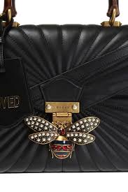 Queen Margaret Shoulder Bag Gucci Vitkac Canada This queen margaret gg purse is a classic example of gucci iconography alongside one of crafted om a brown canvas base with the interlocking gg logo pattern, a signature blue and red web detail. queen margaret shoulder bag gucci