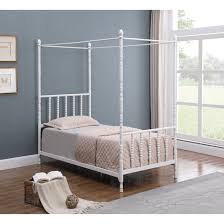 Many of our twin beds have clever storage options such as drawers built in the frame or the possibility to slide boxes underneath. Leena Betony White Twin Canopy Bed On Sale Overstock 31276975