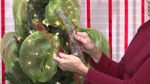 This is a light material that is easy to use. Diy Christmas Tree Decorating With Deco Mesh Modern Mom Life