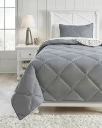 2.the bedding set do not include a comforter filler. The Rhey Tan Brown Gray Twin Comforter Set Available At Ivey S Furniture Serving Easley Pickens And Piedmont Sc