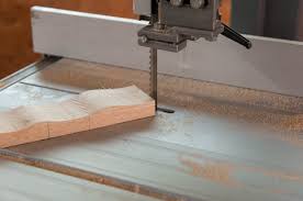 Kitchen with grey cupboards and white countertop. The 10 Best Band Saws
