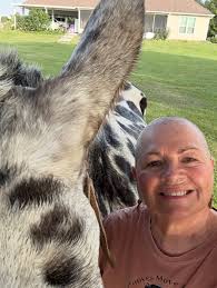 Breast cancer patient with supportive husband and mule