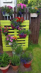 40 amazingly creative diy craft ideas for the most wonderful flower garden my desired home garden projects diy planters pallets garden