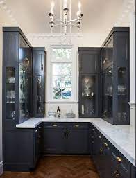 We would like to show you a description here but the site won't allow us. Dark Grey Cabinets With Brass Hardware Yes Kitchen Design Kitchen Remodel Contemporary Kitchen