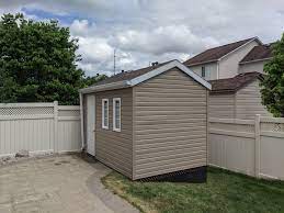 If i had my choice digging into the slope for a level base would keep the ground solid for construction. How S This For A Slope Summit Sheds And Structures Facebook