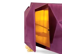 Like the amethyst diamond, the new sideboard also features three highly sculptured doors leading to a gold leaf interior with shelving and two drawers. Diamond Amethyst Sideboard Boca Do Lobo Exclusive Design