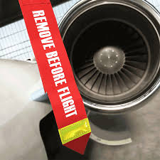 Remove before flight (en français : Jumbo Originals Remove Before Flight Rbf Originals
