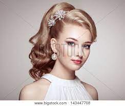 Check spelling or type a new query. Fashion Portrait Of Young Beautiful Woman With Jewelry And Elegant Hairstyle Blonde Girl With Long Wavy Hair Perfect Make Up Beauty Style Woman With Diamond Accessories Poster Id 143447708